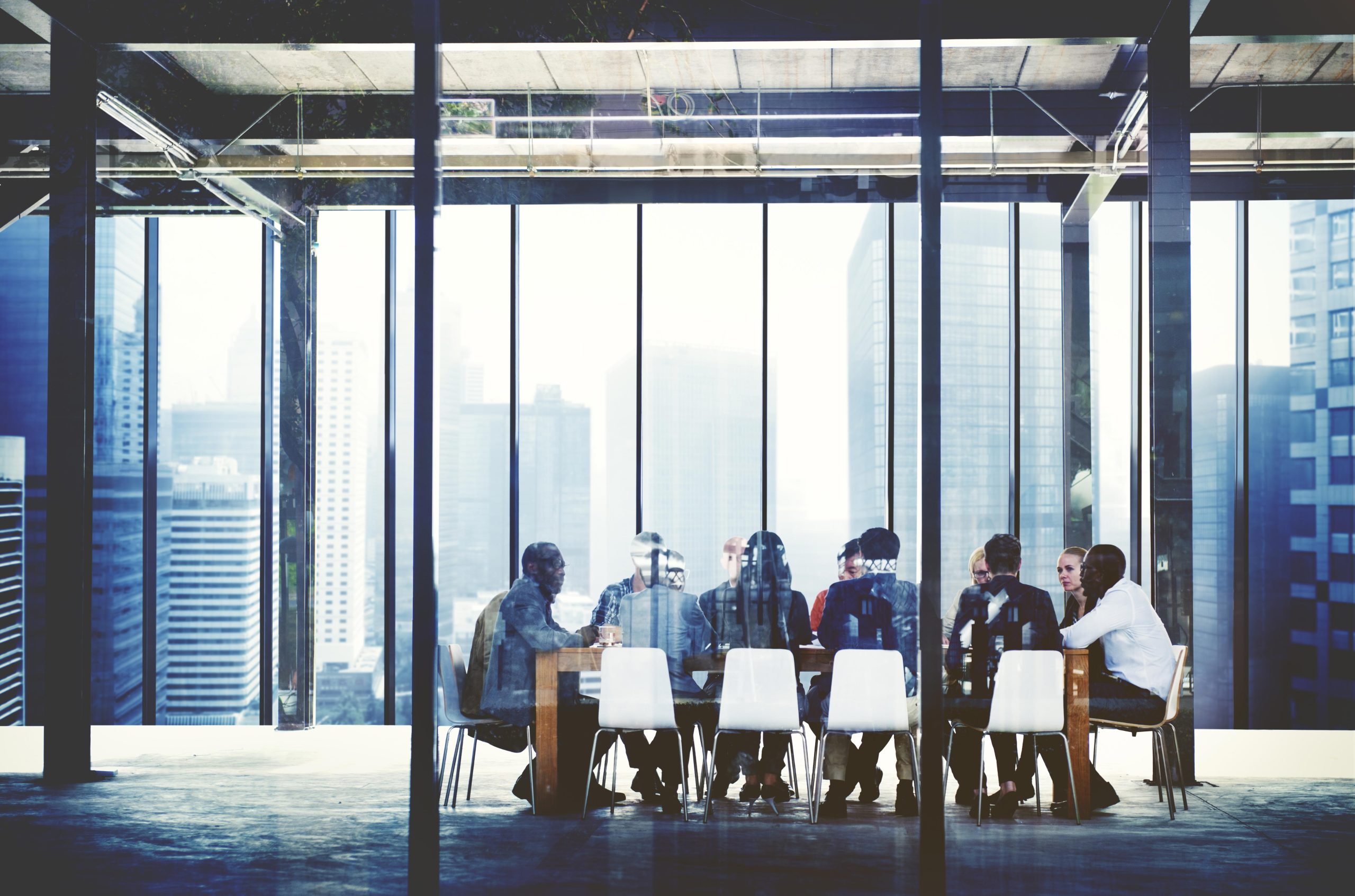 Business-meeting-in-glass-office