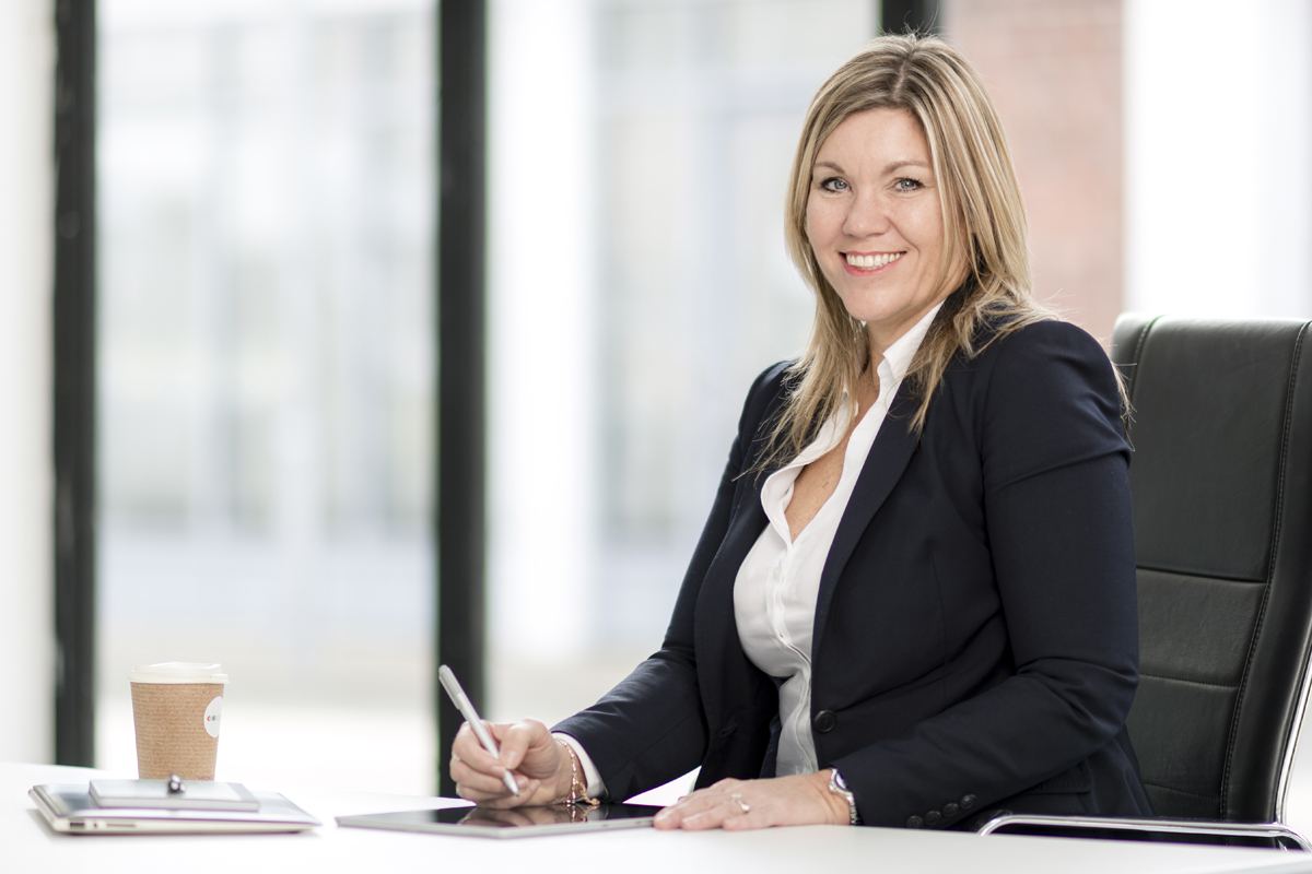 Julie at desk